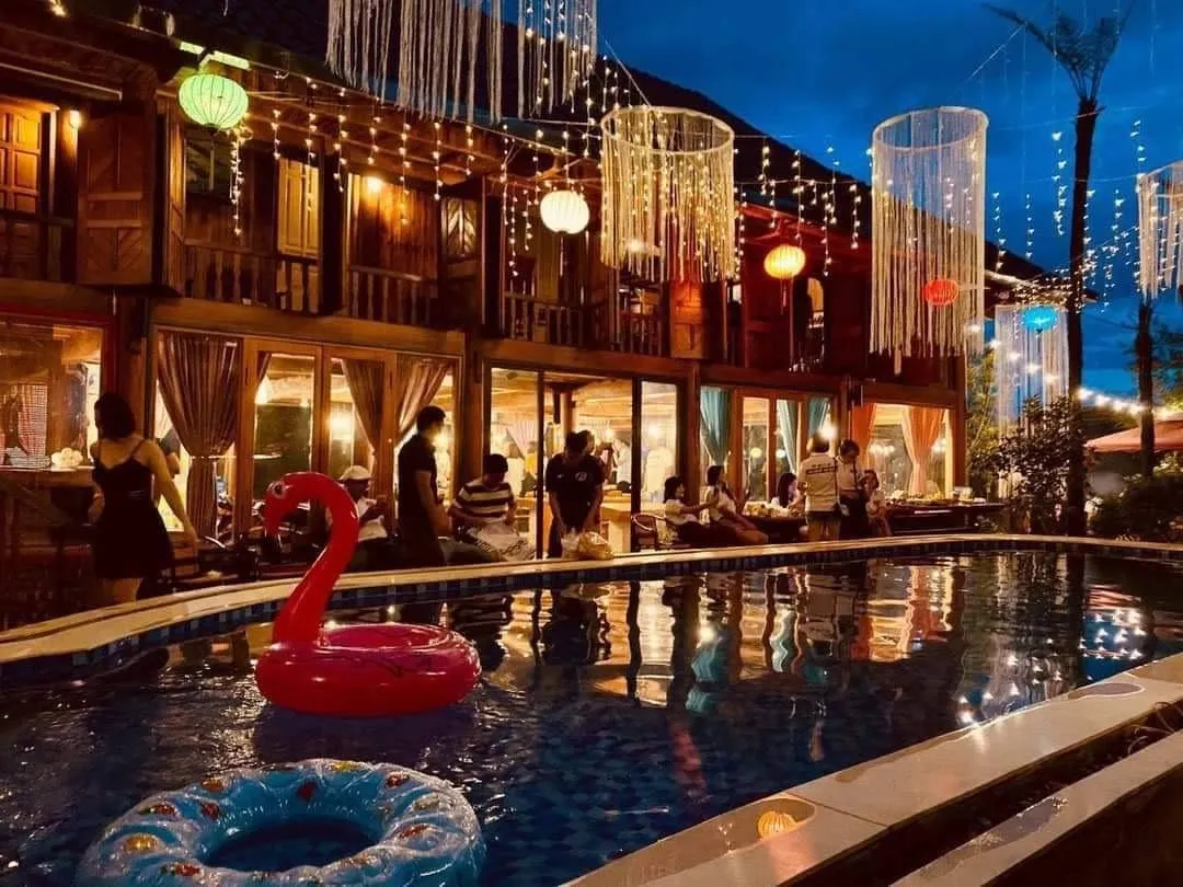 Cozy interior of a triple room with local decor